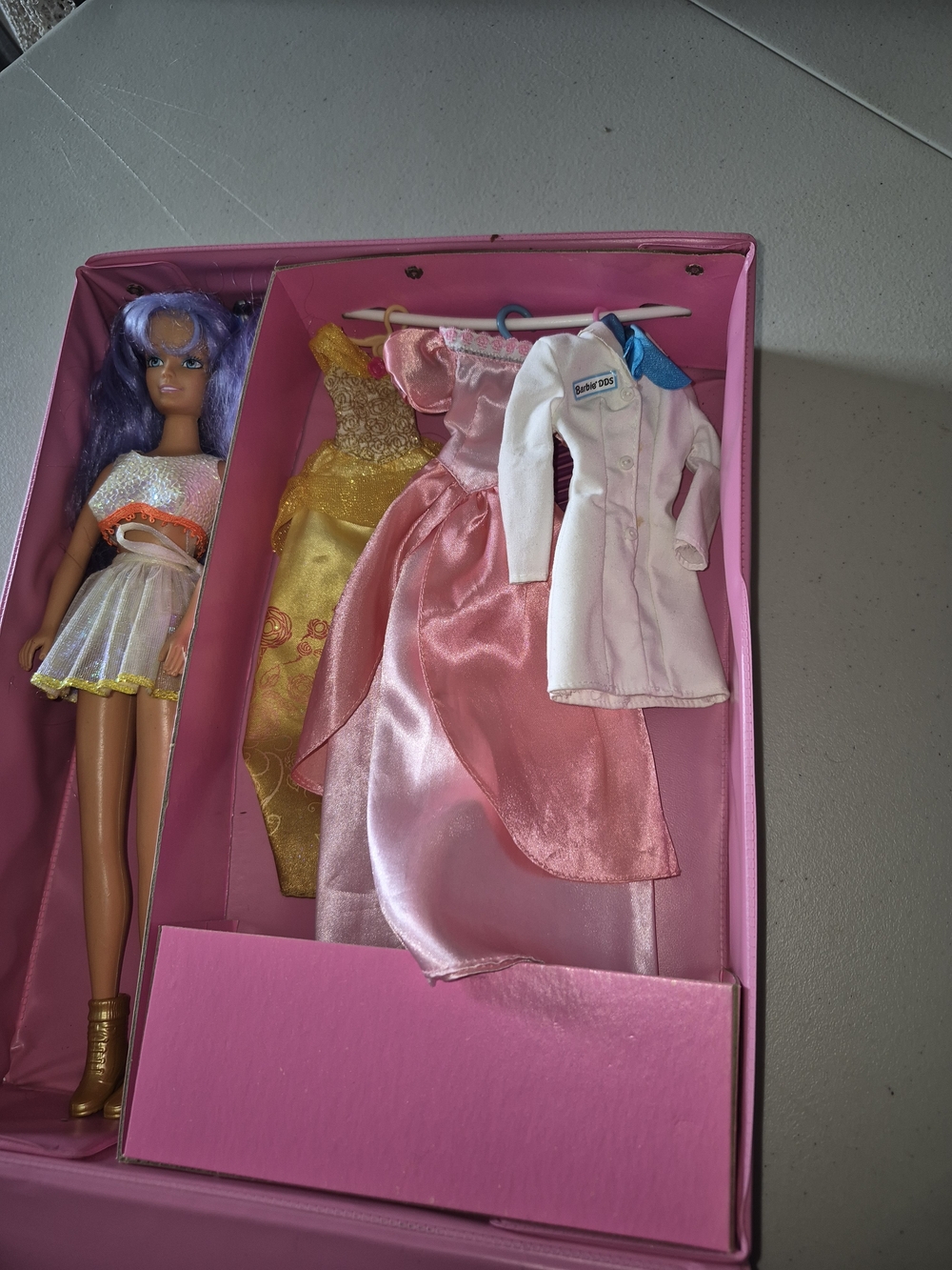 Purple-Haired Fashion Doll with Pink and Gold Dresses